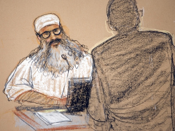 In this photograph of a sketch by courtroom artist Janet Hamlin, Khalid Sheikh Mohammed attends his arraignment at the U.S. Military Commissions, at Guantanamo Bay U.S. Naval Base, in Cuba, Thursday, June 5, 2008. (AP / Janet Hamlin)