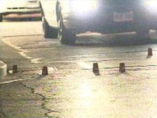 Evidence markers at the scene of a shooting on Danforth Avenue near Ladysmith Avenue on Friday, June 10, 2011. Police said multiple gunshots were fired during a dispute, but no injuries have been reported.
