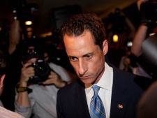 In this June 6, 2011 file photo, U.S. Rep. Anthony Weiner, D-N.Y., leaves a news conference in New York, where he confessed that he tweeted a bulging-underpants photo of himself to a young woman and admitted to "inappropriate" exchanges with six women before and after getting married. According to AP sources, on Thursday, June 16, 2011, Weiner tells associates he will resign. (AP Photo/John Minchillo, File)