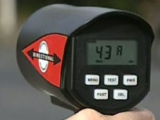 A police officer uses a radar gun to track speeders in this Tuesday, Sept. 7, 2010, file photo.
