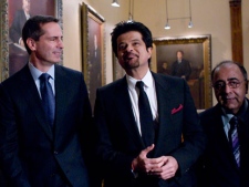 Ontario Premier Dalton McGuinty (left) shows Bollywood superstar Anil Kapoor (centre) around the Ontario Legislature in Toronto on Monday January 17, 2011. Kapoor acts as an Ambassador to the International Indian Film Academy (IIFA), who will hold their annual award show in the city this weekend. (THE CANADIAN PRESS/Chris Young)