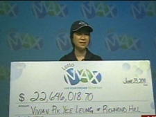 Vivian Pik Yee Leung stepped forward to accept a cheque for more than $22.5 million at the Ontario Lottery and Gaming headquarters in downtown Toronto on Thursday, June 23, 2011. 