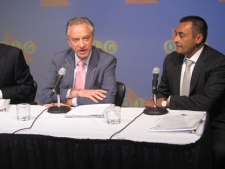 OLG president Rod Phillips, left to right, chairman Paul Godfrey and vice-president Preet Dhindsa announce a record-setting payment to the Ontario government at a news conference in Toronto on Friday, June 24, 2011. (THE CANADIAN PRESS/Will Campbell)