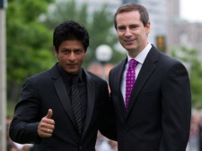 Shahrukh Khan and Ontario Premier Dalton McGuinty (right) arrive on the green carpet at the 2011 International Indian Film Academy Awards in Toronto on Saturday June 25, 2011. (THE CANADIAN PRESS/Darren Calabrese)