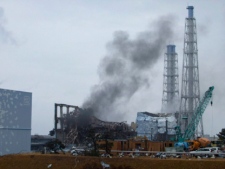  In this Monday, March 21, 2011 photo released by Tokyo Electric Power Co., gray smoke rises from Unit 3 of the tsunami-stricken Fukushima Dai-ichi nuclear power plant in Okumamachi, Fukushima Prefecture, Japan. Japanese officials ordered those living within 12 miles of the site to leave; the U.S. government told its citizens within 50 miles to evacuate. (AP Photo/Tokyo Electric Power Co.)
