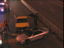 Police investigate an accident involving a motorcycle on the Don Valley Parkway. (CP24)