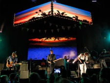 Arcade Fire performs during the Bonnaroo Music Festival in Manchester, Tenn., Friday, June 10, 2011. (AP Photo/Dave Martin)