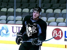 In this photo provided by www.PittsburghPenguins.com, Pittsburgh Penguins center Sidney Crosby returns to the ice for the first time, Monday, March 14, 2011, since missing 29 NHL hockey games with a concussion in Pittsburgh. Crosby practiced in full gear for about 15 minutes at the Consol Energy Center. (AP Photo/www.PittsburghPenguins.com) 