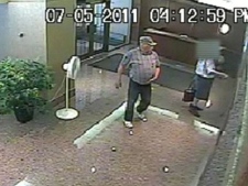 Toronto police released security footage of a man accused of duping the elderly out of money by claiming to be an undercover police officer.