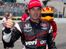 Will Power of Australia gives a thumbs up after winning pole position for Toronto Indy in Toronto on Saturday July 9, 2011. THE CANADIAN PRESS/Frank Gunn