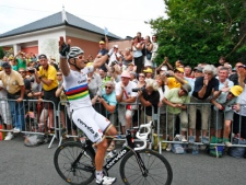 Thor Hushovd of Norway celebrates after crossing the finish line of the 13th stage of the Tour de France cycling race over 152.2 kilometers (94.6 miles) starting in Pau and finishing in Lourdes, Pyrenees region, France, Friday July 15, 2011. (AP Photo/Laurent Rebours)