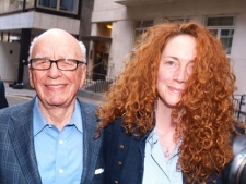 Chairman of News Corporation Rupert Murdoch, left, and Rebekah Brooks, chief executive of News International, are pictured as they leave his residence in central London in this Sunday, July 10, 2011 file photo. Brooks resigned as chief executive of News International on Friday, July 15, 2011. (AP Photo/Ian Nicholson)