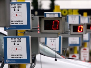 In this April 9, 2009 photo, electronic readers and displays for NEXUS identification cards are lined-up at a border crossing from Canada into the United States at Blaine, Wash. (AP Photo/Elaine Thompson)