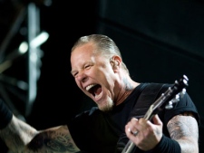 Lead singer and guitarist James Hetfield of the American heavy metal band Metallica performs during the World Magnetic Tour with the band before a crowd at the Ramat Gan Stadium just outside Tel Aviv, Israel, Saturday, May 22, 2010. (AP Photo/Ariel Schalit)
