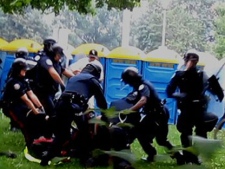 Video images released on Dec. 7, 2010 show the arrest of Adam Nobody during a G20 summit demonstration on June 26, 2010.