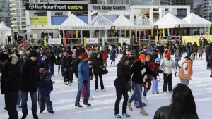 A crowd of skaters practice their skills on the Natrel Rink at the Harbourfront Centre in Toronto. (HarbourfrontCentre.com)