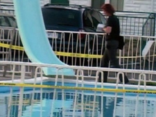 Police at the scene of a drowning at the A-1 Motel on Lundy's Lane in Niagara Falls on Tuesday, July 26, 2011. A 13-year-old boy drowned in the motel's pool.