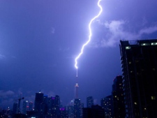 A bolt of lightning strikes the CN Tower during a thunderstorm in Toronto on Wednesday, Aug. 24, 2011. (Photo courtesy of Alice Lipczak).