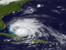 In an image provided by NOAA and made by the GOES East satellite Hurricane Irene is shown as it move over the Bahama Thursday Aug. 25, 2011. Irene could hit North Carolina's Outer Banks on Saturday afternoon with winds around 115 mph (185 kph) and it's predicted to go up the East Coast, dumping rain from Virginia to New York City. (AP Photo/NOAA)