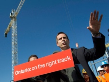 Ontario Premier Dalton McGuinty speaks after touring a new commercial and residential development project in Markham, Ontario on Tuesday August 23, 2011. (THE CANADIAN PRESS/Frank Gunn)