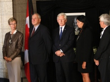 NDP interim leader Nycole Turmel, left to right, former NDP leader Ed Broadbent, interim Liberal Leader Bob Rae and his wife Arlene Perly Rae pay their respects to NDP Leader Jack Layton as he lies in state on Parliament Hill in Ottawa on Wednesday, Aug. 24, 2011. Layton died of cancer on Monday, Aug. 22, 2011. (THE CANADIAN PRESS/Ryan Remiorz)