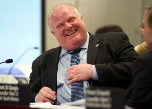 Toronto Mayor Rob Ford laughs during the Executive Council meeting at City Hall in Toronto on Wednesday January 22, 2014. (Frank Gunn/The Canadian Press)