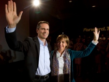 Ontario Premier Dalton McGuinty and his wife Terri wave to supporters before releasing the Liberal party platform at an event in Toronto on Monday, Sept. 5, 2011. (THE CANADIAN PRESS/Frank Gunn)