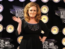 Adele arrives at the MTV Video Music Awards on Sunday Aug. 28, 2011, in Los Angeles. (AP Photo/Chris Pizzello)