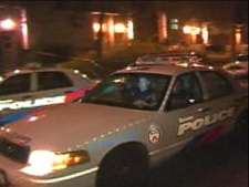 This screen grab shows a Toronto police car at the scene of a shooting on Humber Boulevard on Tuesday, Sept. 7, 2011. A man suffered non-life-threatening injuries when he was shot in the lower back.