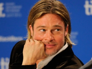 Actor Brad Pitt participates in a news conference for the film "Moneyball" during the Toronto International Film Festival on Friday, Sept. 9, 2011, in Toronto. (AP Photo/Evan Agostini) 
