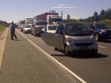 Traffic is backed up for several kilometres on Highway 400, near 11th Line, after a motorcycle crash Friday, Sept. 9, 2011. (CP24/Lindsey Deluce)