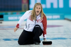 Canada skip Jennifer Jones calls to sweepers during the women's curling gold medal game against Sweden at the Sochi Winter Olympics Thursday, Feb. 20, 2014 in Sochi, Russia. (The Canadian Press/Adrian Wyld)