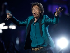 Mick Jagger performs at the 53rd annual Grammy Awards on Sunday, Feb. 13, 2011, in Los Angeles. (AP Photo/Matt Sayles)