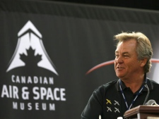 Canadian astronaut Bjarni Tryggvason speaks during a celebration of the Canada's contribution to the Apollo 11 space mission during a 40th moonwalk anniversary celebration at the Canadian Air and Space Museum in Toronto, Monday, July 20, 2009. (The Canadian Press Images PHOTO/Canadian Air & Space Museum)