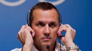 Team Canada director of hockey operations Steve Yzerman listens to a question asked in the Russian language while speaking to the media during a press conference at the 2014 Sochi Winter Olympics in Sochi, Russia on Saturday, February 15, 2014. THE CANADIAN PRESS/Nathan Denette 