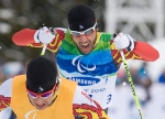 In this Monday, March 15, 2010, file photo, Brian McKeever races to a gold medal win in the men's 20-kilometre free, visually impaired cross-country ski race at the 2010 Winter Paralympic Games in Whistler. (The Canadian Press/Jonathan Hayward)