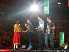 Singer Nelly Furtado, alongside Free The Children co-founders Craig and Marc Kielburger, announces a $1 million donation to Free The Children in support of girls education in Africa on Tuesday, Sept. 27, 2011, at We Day in Toronto. (The Canadian Press Images PHOTO/Free The Children)