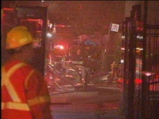 Emergency crews are seen at the site of a fatal fire in Chinatown Saturday night. (CP24)