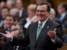 Minister of Finance Jim Flaherty rises during Question Period in the House of Commons on Parliament Hill in Ottawa, Wednesday September 28, 2011. (THE CANADIAN PRESS/Adrian Wyld)