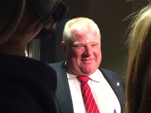Toronto Mayor Rob Ford smiles as he speaks to reporters at city hall on Monday, March 24, 2014. (CP24/Arda Zakarian) 
