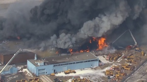 Firefighters battle inferno at factory