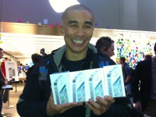 Nelson Fong was first in line outside the Apple store at Eaton Centre and waited more than 24 hours to get his hands on the new iPhone 4S smartphone Friday, Oct. 14, 2011. (CP24/Mathew Reid)