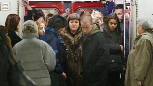 Commuters cram into a subway car in Toronto in this file photo. (CP PHOTO/Kevin Frayer)