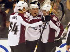 Colorado Avalanche right winger David Jones (54), centre Paul Stastny (26) and right winger Milan Hejduk (23) celebrate their second goal during period NHL action against the Toronto Maple Leafs in Toronto on Monday October 17, 2011. THE CANADIAN PRESS/Frank Gunn