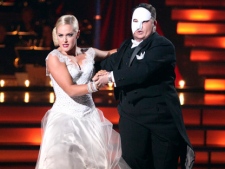 In this Oct. 24, 2011 image released by ABC, Chaz Bono, right, and his partner Lacey Schwimmer perform on the dancing competition series "Dancing with the Stars," in Los Angeles. Bono and Schwimmer were voted off the show on Tuesday. (AP Photo/ABC, Adam Taylor)