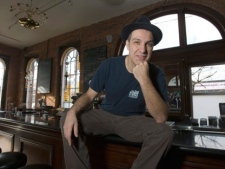 Dave Bidini poses for a photo at the Gladstone Hotel in Toronto on Tuesday Nov. 6, 2007. As soon as Bidini put the word out that he was writing a book about Gordon Lightfoot, the stories started to pour in. (THE CANADIAN PRESS/Frank Gunn)