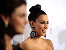 Television personality Kim Kardashian attends the Gabrielle's Angel Foundation for Cancer Research "Angel Ball" honors gala at Cipriani's Wall St. on Monday, Oct. 17, 2011 in New York. (AP Photo/Evan Agostini)