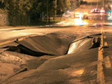 A massive sinkhole opened up on Bayview Avenue in Thornhill because of a water main break Friday, Nov. 4, 2011. (CP24/Tom Stefanac)