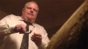 Toronto Mayor Rob Ford holds what appears to be a pipe, as seen in this image provided to Gawker.com. CTV News has not been able to verify the authenticity of the video image. Ford says he will take a leave of absence to seek 'immediate help,' as reports emerged about his alleged drug and alcohol use.
