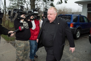 Toronto Mayor Rob Ford leave his home Thursday May 1, 2014, after announcing he would take an immediate leave of absence. (The Canadian Press/Frank Gunn)